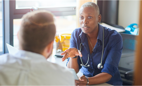 Nurse talking to patient
